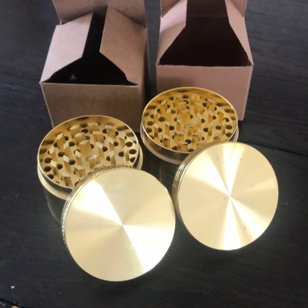 Two Gold Herb Grinders